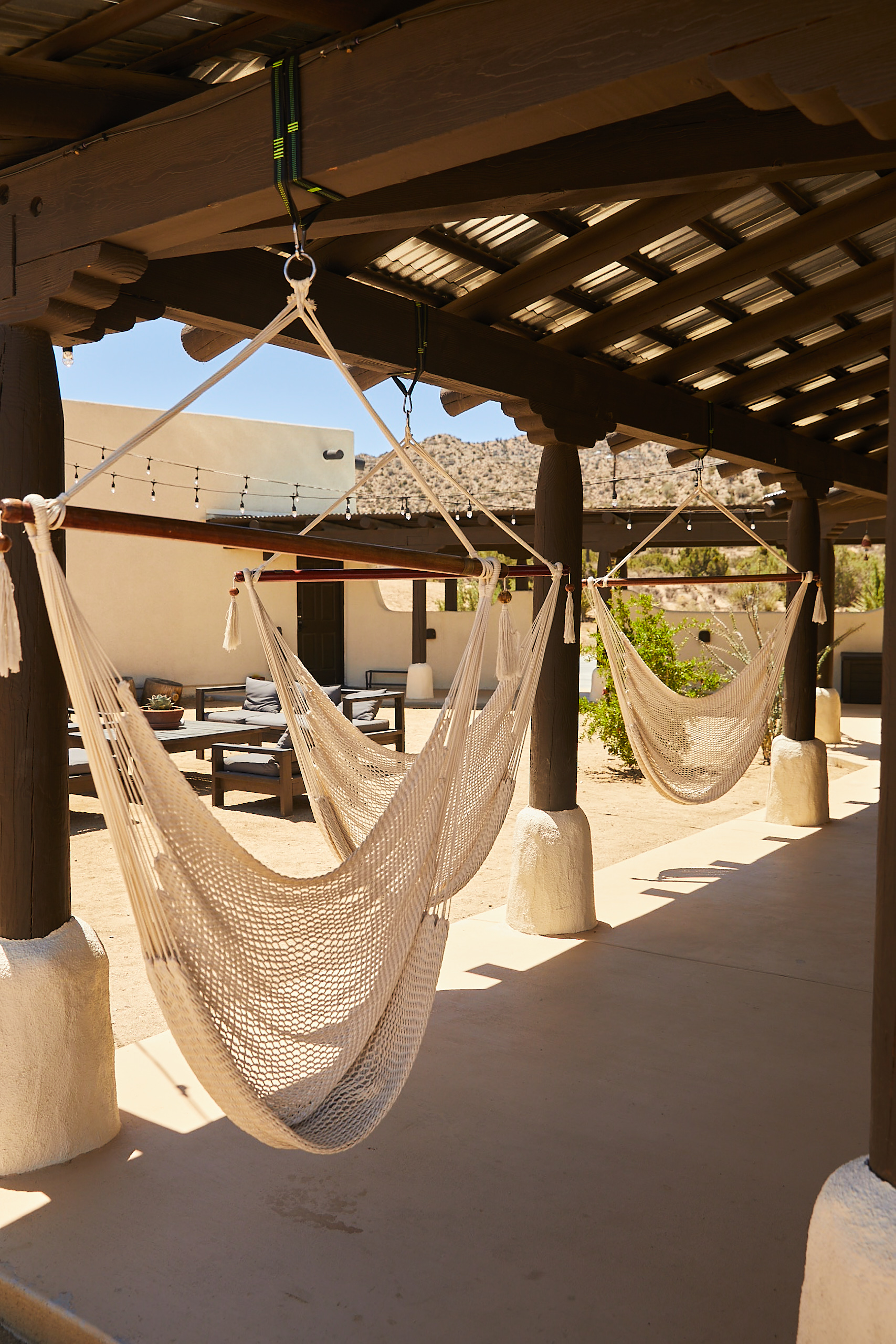 Hammocks under a wooden pergola